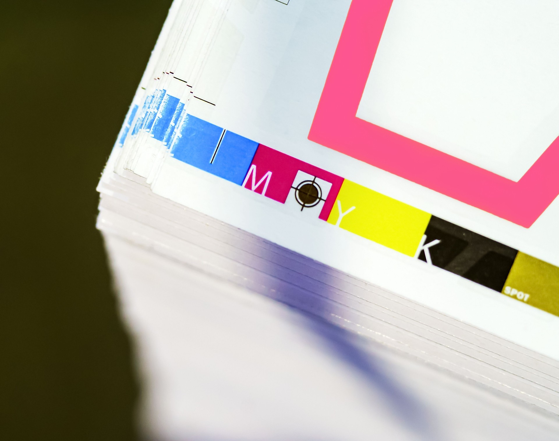 Sheets of printed products. Offset printing. CMYK press. Paper at the printing house.